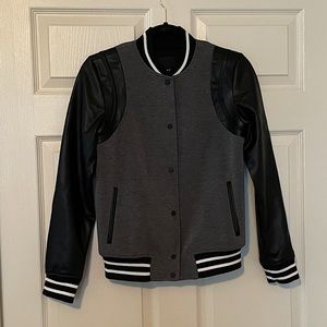 TROUVÉ BOMBER JACKET. FAUX LEATHER SLEEVES